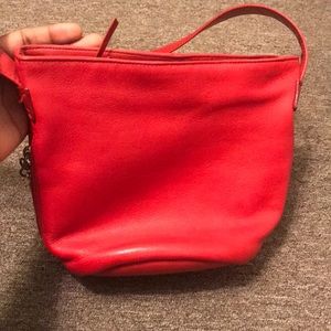 A red shoulder bag